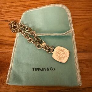 Tiffany & Co. Silver Charm Bracelet with Blue Pouch